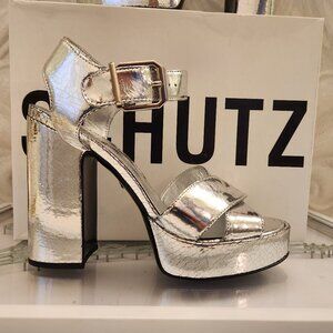 SCHUTZ "Penelope" Metallic Hommer Silver Platform San. NIB. Size: various